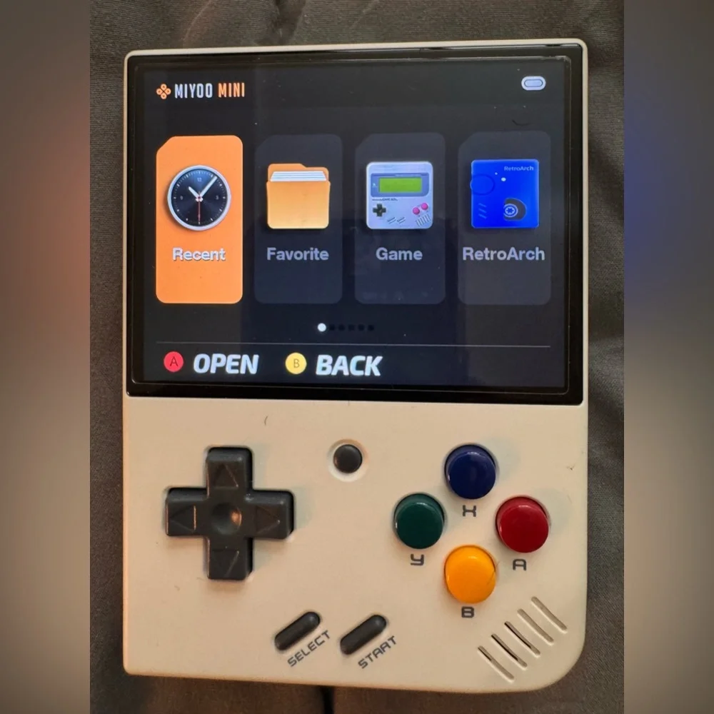 Motion Mini White and Black Handheld Gaming Console with Retro Design